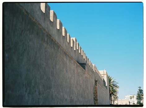 A picturesque view of a historic wall in sunny Essaouira, Morocco.