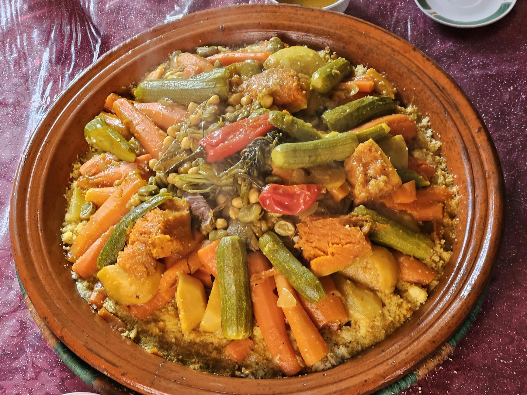 Colorful Moroccan vegetable tagine with carrots and zucchini.